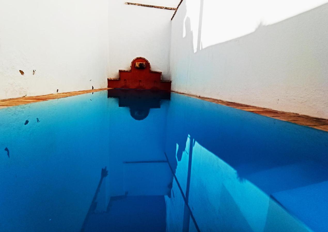 Frenteabastos Suites Cafe Hostal & Apartments كارمونا المظهر الخارجي الصورة