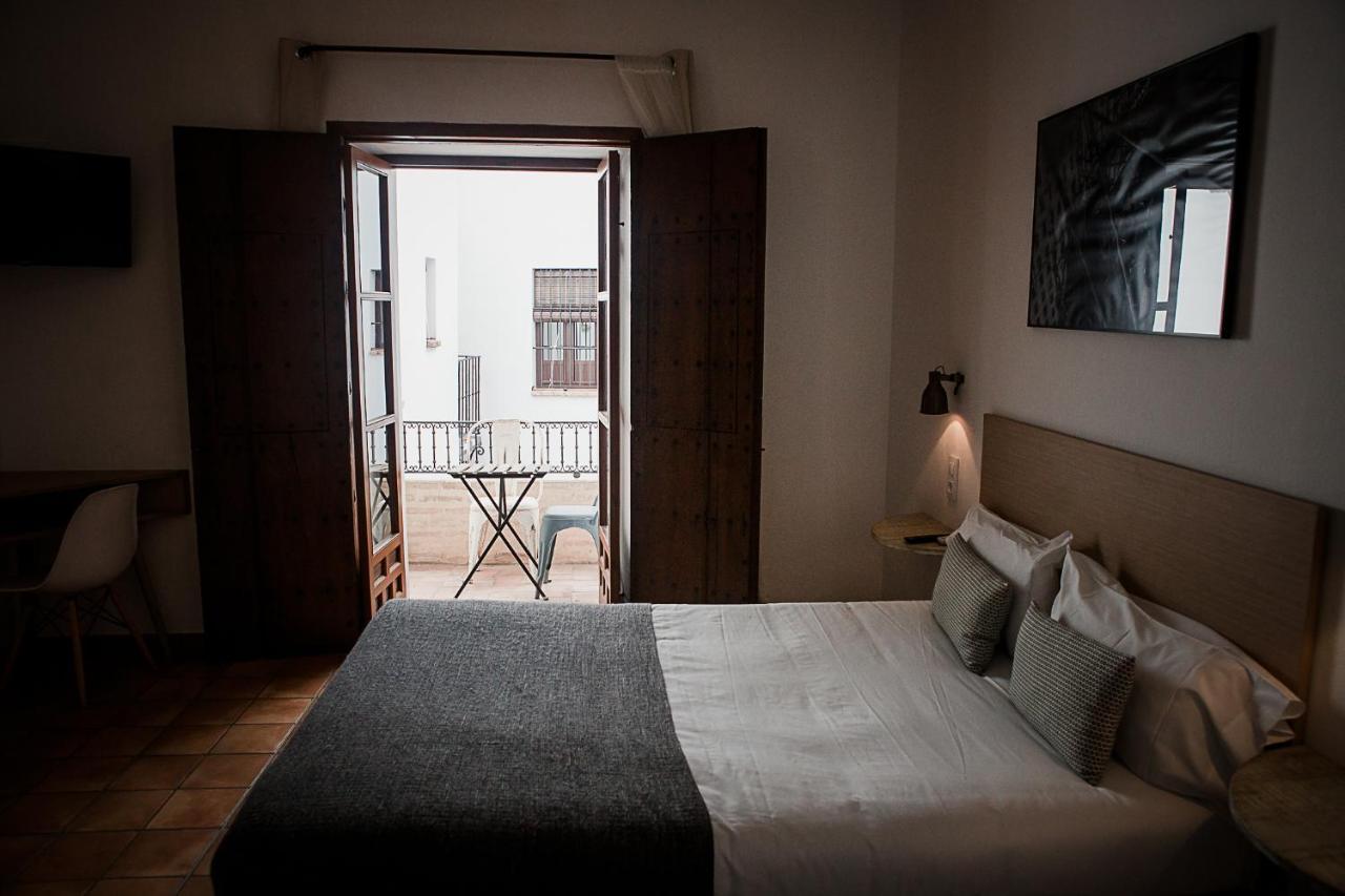 Frenteabastos Suites Cafe Hostal & Apartments كارمونا المظهر الخارجي الصورة